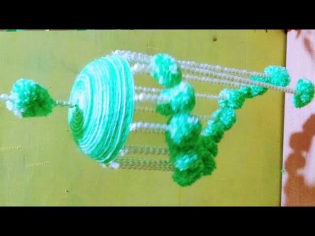Wind chime.wall hanging useing woolen.room decorate idea.craft idea out of woolen.Krishna tutorial
