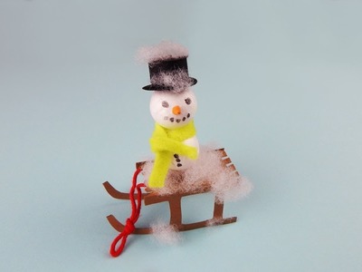 Winter decoration snowman with sleigh DIY Dekoration Schneemann mit Schlitten