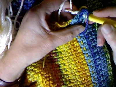 Slip stitches going through crochet fabric to form the base of a border