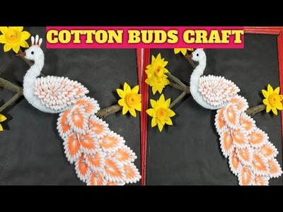 Pecock making easily with cotton buds . Cotton pecock wall hanging craft ideas.