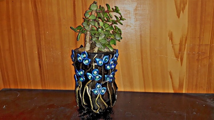 How to make a cement pot using an old plastic bottle.