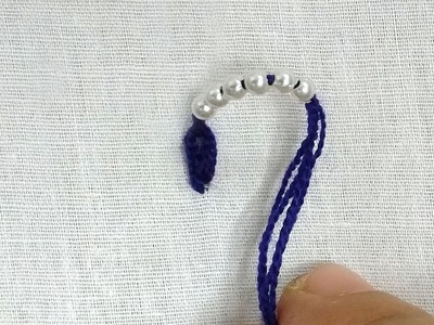 Hand embroidery pearl border design for dress.