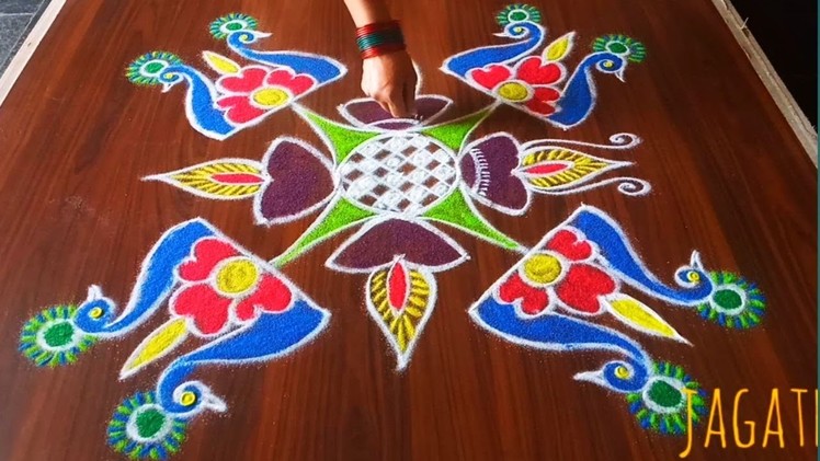 Simple and easy peacock rangoli designs with 7*7 dots made easy to draw