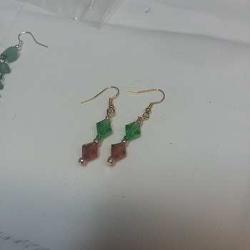 Simple earrings.  Green bicone and rust color with gold beads  115802