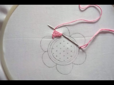 Hand embroidery. Button hole stitch flower design.