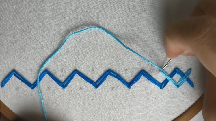 Hand embroidery lazy daisy variation border design