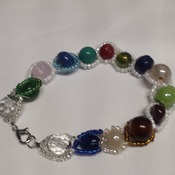 colored beads wrapped in glass beads.  202444