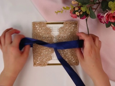 Elegant rose gold and navy blue glitter wedding invitations with gold glitter mirror paper bottom