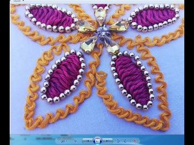 Hand Embroidery:  beautifull flower with two difirent stitch and pearl