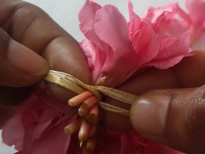 French braid type flower stringing method.Different method to tie flowers.string garland.veni.Gajra