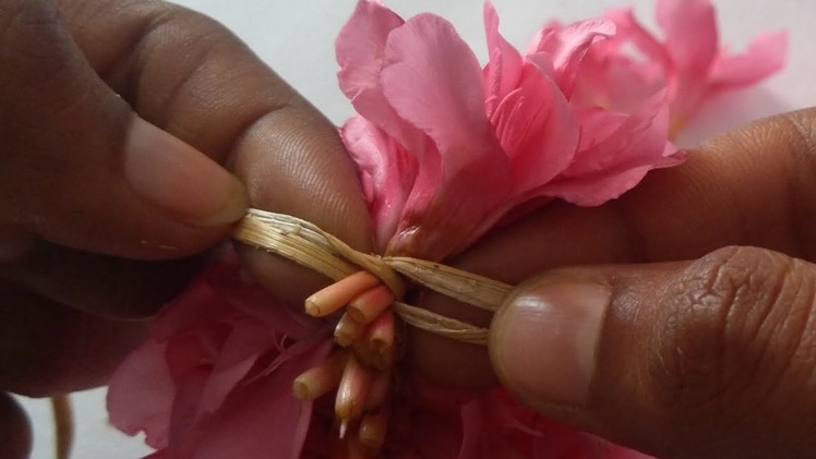 French braid type flower stringing method.Different method to tie flowers.string garland.veni.Gajra