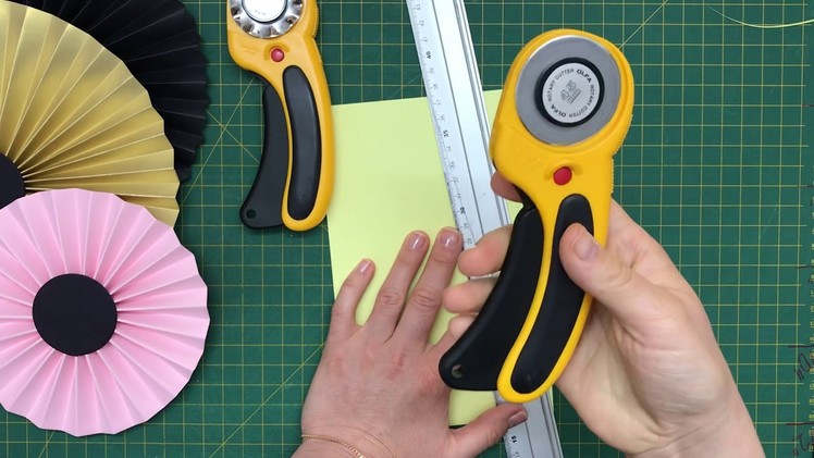 Rotary cutters by OLFA brand. how to make a curvy cut. how to make a paper fan