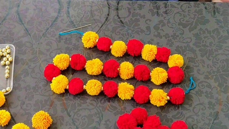 AMAZING GARLAND CRAFT WITH WOOLEN POM POM || Marigold Flower Mala Making From Woolen