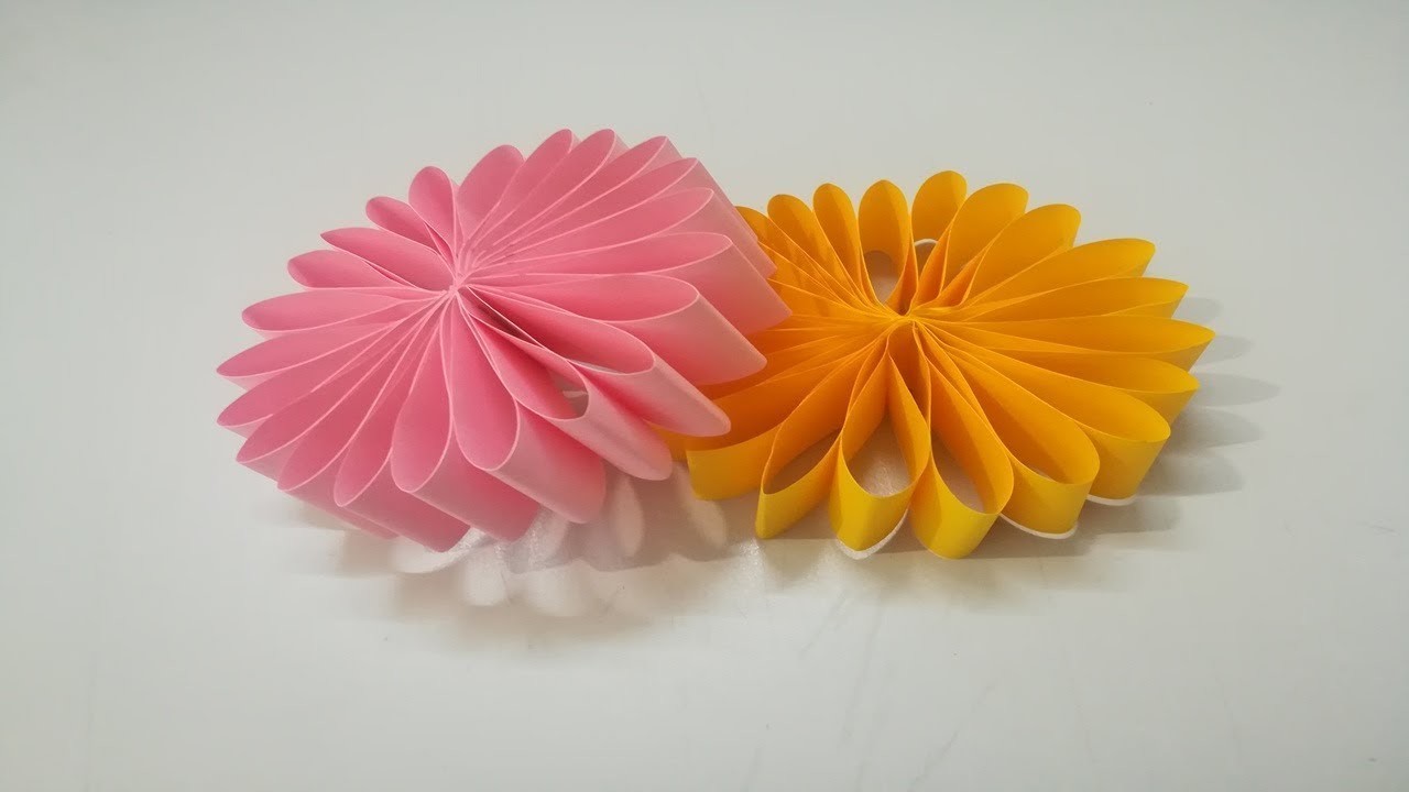 Como se hace una flor de papel