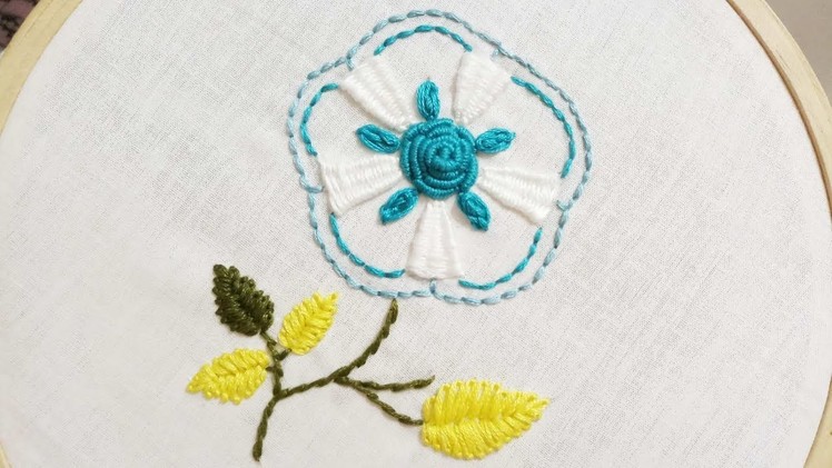Hand embroidery of a flower with weaving bar stitch and bullion stitch
