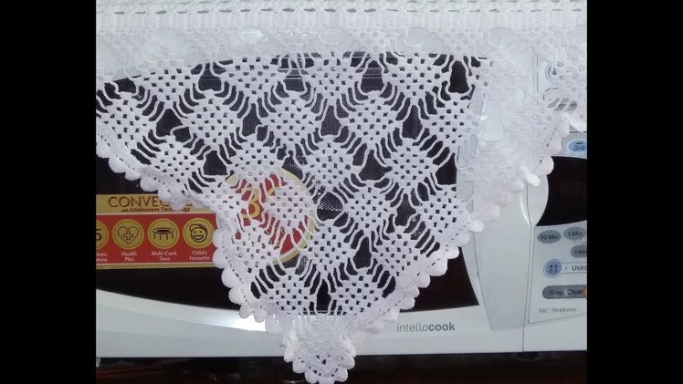 Beautiful triangle shape crochet oven cover