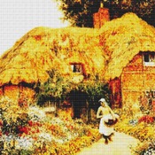 Woman Before A Cottage Cross Stitch Pattern