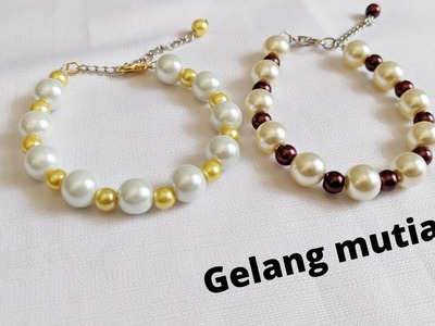 Membuat gelang dari mutiara.make a bracelet from pearl
