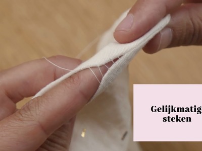 Hoe naai je een keergat toe: video tutorial