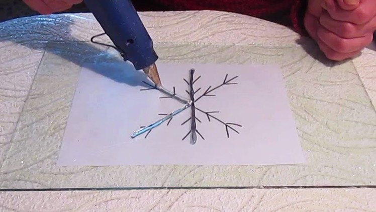 Shiny hot glue snowflake diy. Christmas crafts