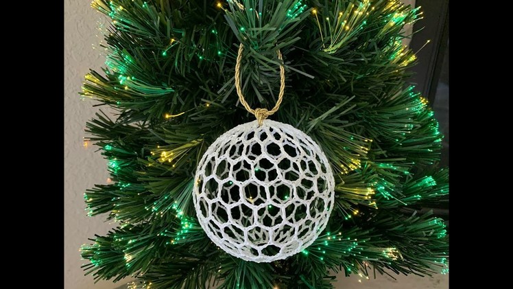 Crochet ball for Christmas tree with honeycomb pattern