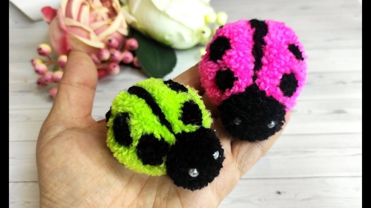 A  Ladybug Making of pom-poms.  Ladybug made of Wool Yarn. DIY ideas from pom-poms.