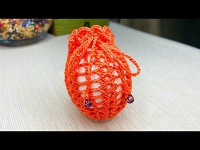 Video review of crocheting an Easter egg orange bag cover.