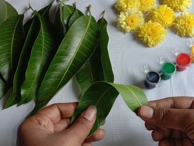 Easy and beautiful decoration idea using mango leafs & chamanthi flowers.beautiful flower toran
