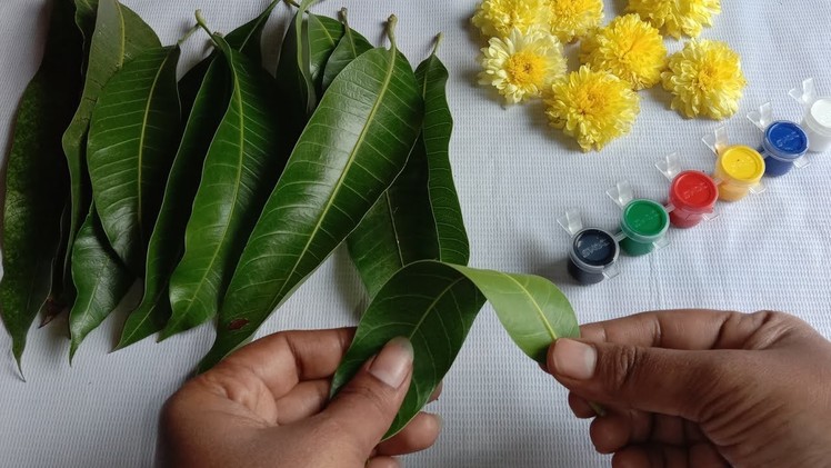 Easy and beautiful decoration idea using mango leafs & chamanthi flowers.beautiful flower toran