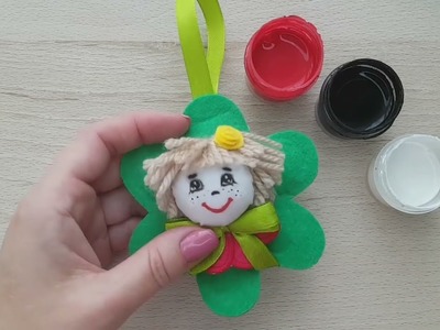 Naughty doll pendant for keys made of pieces of fabric and felt