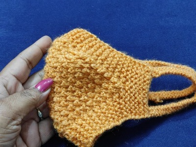 Wollen mask knitting step by step with design.
