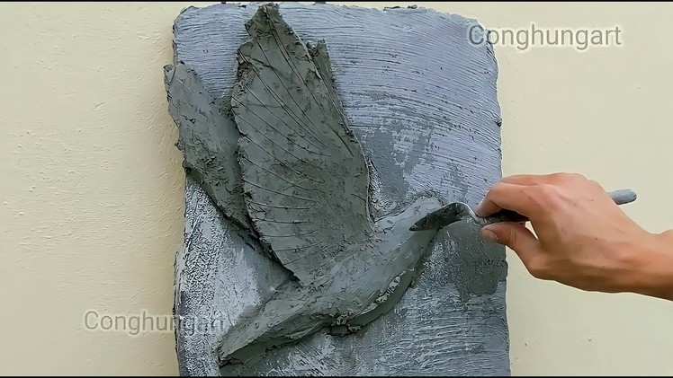 Amazing DIY hand-made bas-relief of flying pigeons. with sand cement