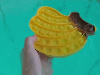DIY idea Pop it in the pool, Banana Pop it Fidget toys training in water