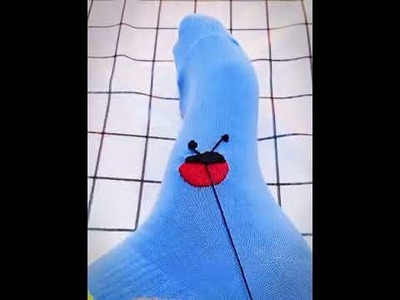 Sewing patterns decorate holes in socks