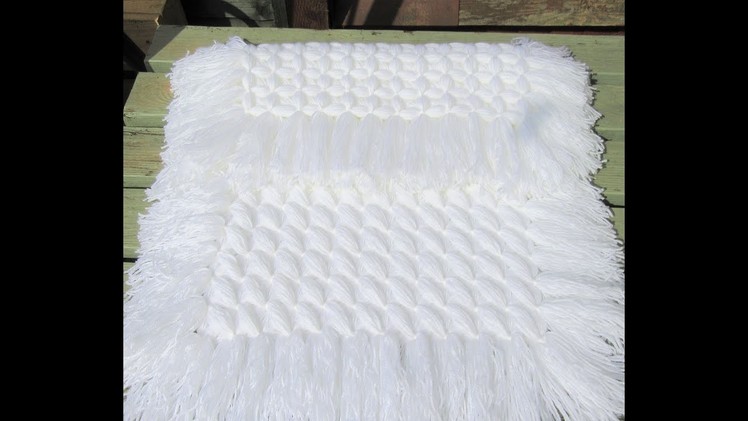 Criss Cross Blanket part 1 made on a pom pom loom frame