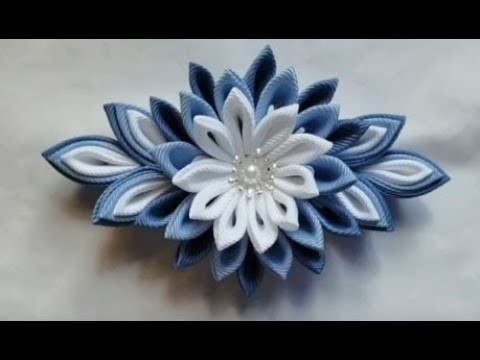 Hair bow tutorial simply2cute.com.  How to make a kanzashi ribbon flower hair clip step by step