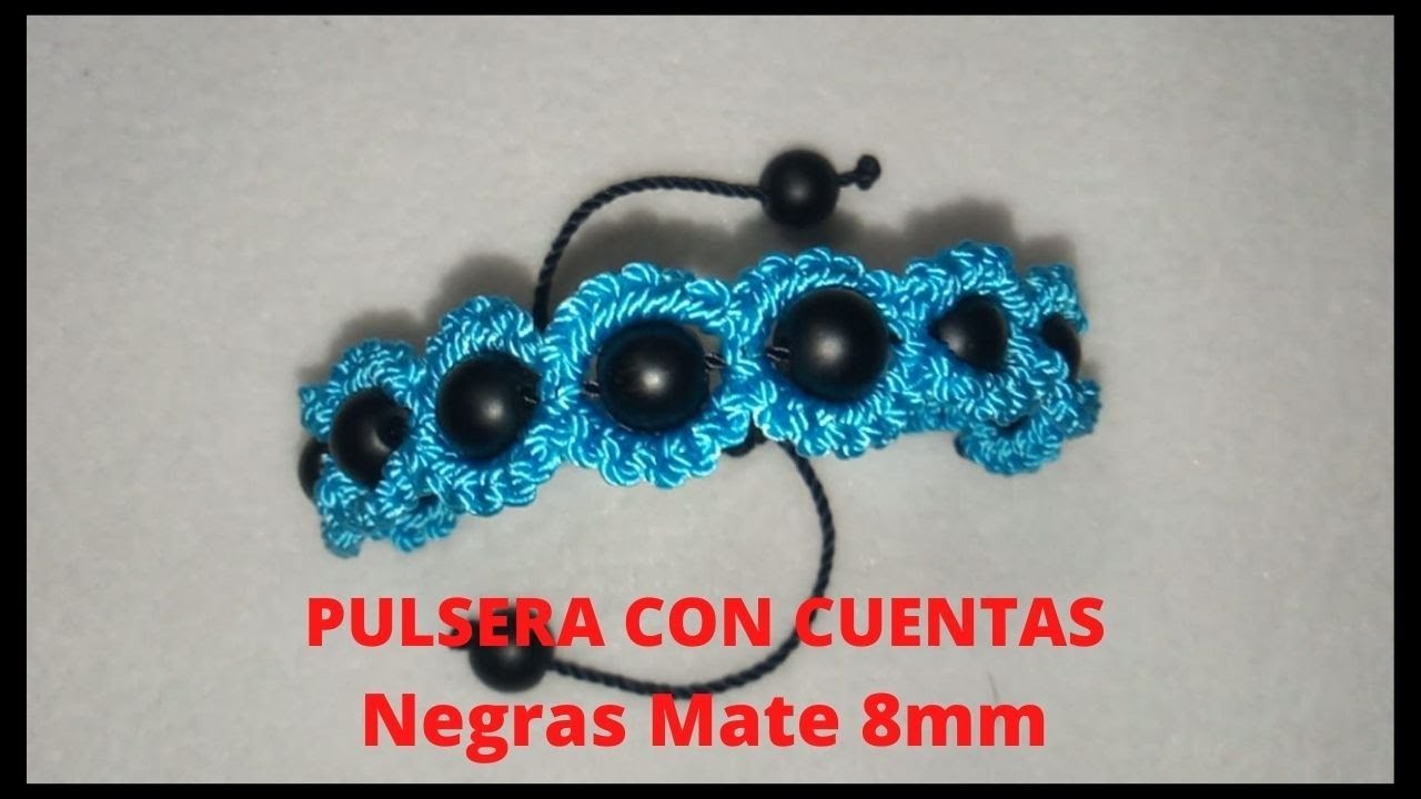 PULSERA CON HILO NAYLON Y CUENTAS NEGRAS MATE  . BRACELET WITH NAYLON THREAD AND MATT BLACK BEADS