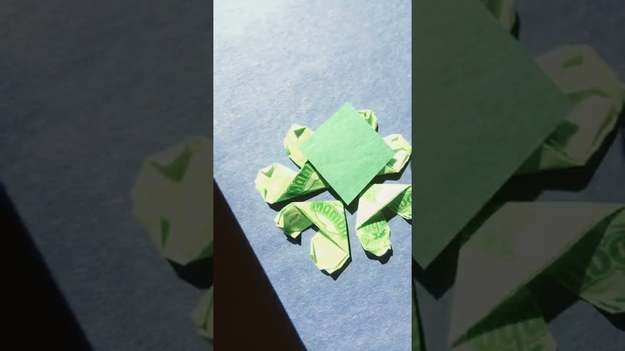 Making a four leaf clover with origami hearts