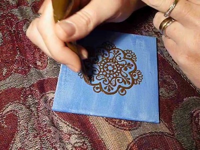 Henna application mandala on canvas board