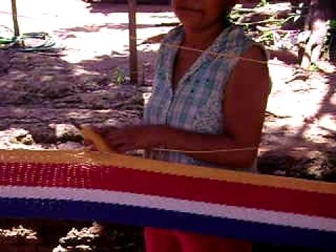 Woman making a hammock in El Hormigón, Masaya