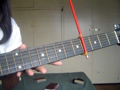 How to make a capo using a pencil and 2 rubberbands!! the easiest way!!