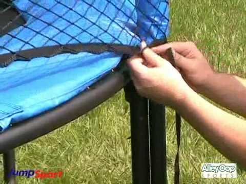 Securing the bottom of the net to the trampoline rail