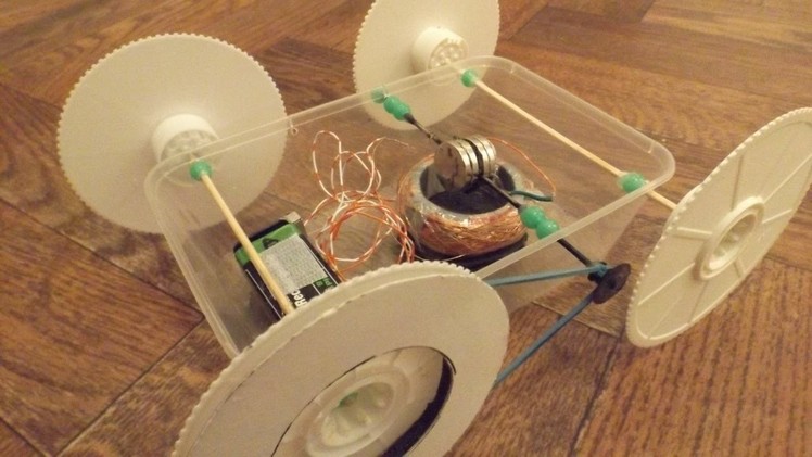 Home made electric motor drives home made toy car