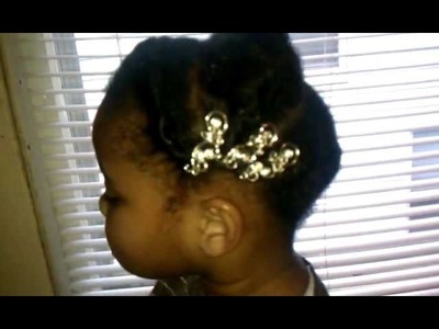 Twist, Tuck & Pin on my daughter's hair