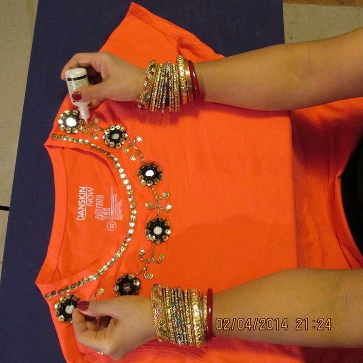 T-SHIRT DECORATIONS: SEW MIRRORS ON A T-SHIRT AND MAKE IT LOOK OUTSTANDING.
