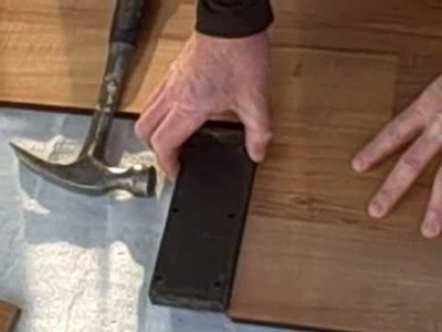 How to Install Laminate Flooring, Part 1 - Tapping Block