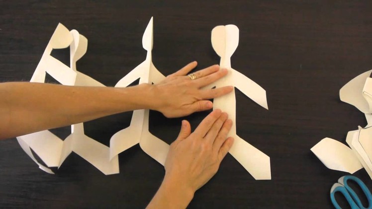 How to make paper dolls holding hands