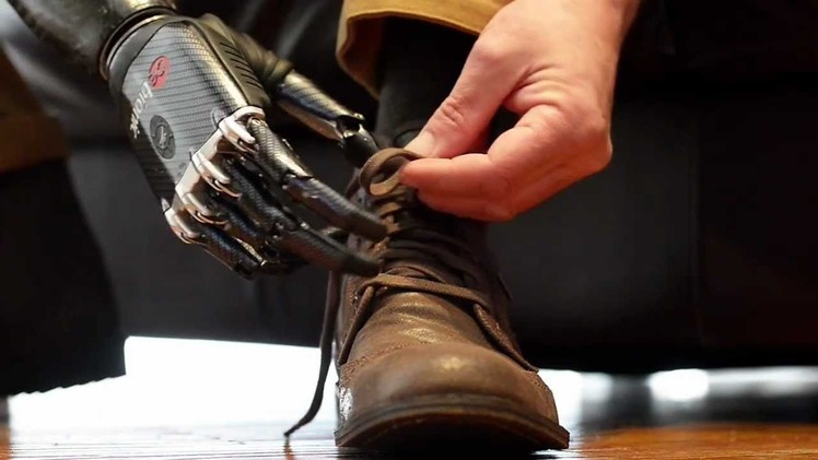 'Terminator' false arm ties shoelace and deals cards