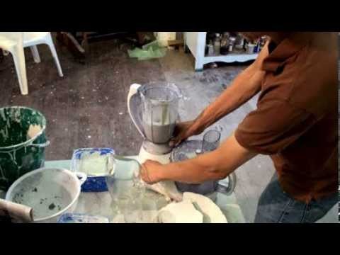 Expert making a small batch of paperclay. paper clay in a kitchen food blender