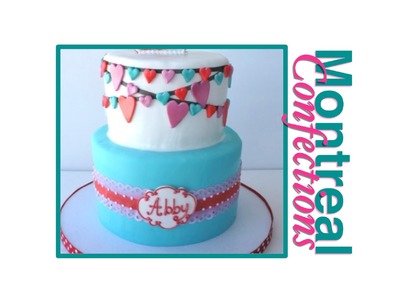 Heart themed first birthday cake